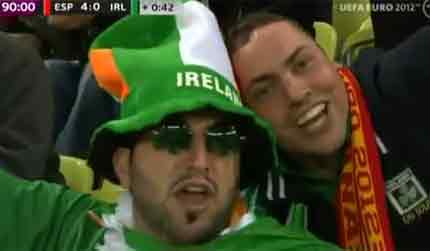 Irish and Spanish soccer fans celebrate during Spain Ireland match.